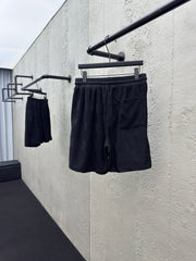 Checkerboard embroidered woolen shorts