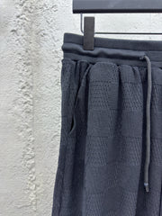 Checkerboard embroidered woolen shorts