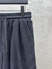 Checkerboard embroidered woolen shorts