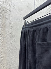 Checkerboard embroidered woolen shorts