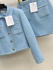 A blue, elegant, woven suit