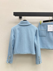 A blue, elegant, woven suit