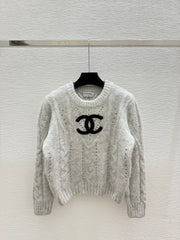 Solid color simple hollow round neck knitted long sleeves