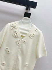 V-neck sweater with 3D floral embellishments