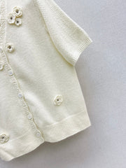 V-neck sweater with 3D floral embellishments