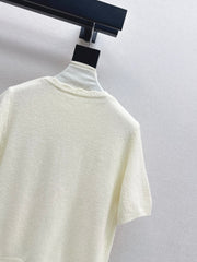 V-neck sweater with 3D floral embellishments