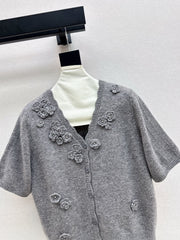 V-neck sweater with 3D floral embellishments