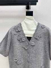 V-neck sweater with 3D floral embellishments