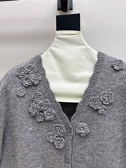 V-neck sweater with 3D floral embellishments