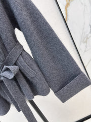 Fox fur-trimmed knitted coat