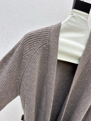 A relaxed mid-length knitted jacket