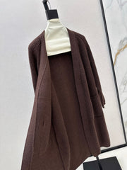 A relaxed mid-length knitted jacket