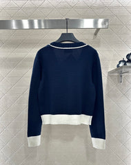 Color-blocked knit cardigan with bound edges