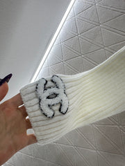 Knitted patchwork collared fur coat.
