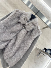 Knitted patchwork collared fur coat.