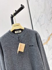 Half-button crew neck cashmere knit sweater