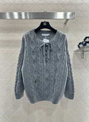 Crocheted drawstring pullover sweater