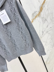 Half-open zip-up knit sweater