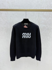 Color-blocked lettered crew neck knit long-sleeved top