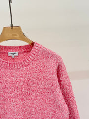 Sweater with small pockets at the hem