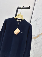 Half-button crew neck cashmere knit sweater