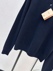 Half-button crew neck cashmere knit sweater