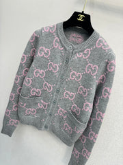 Pink and gray color-blocked crew neck cardigan