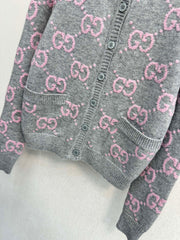 Pink and gray color-blocked crew neck cardigan