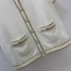 Gold-trimmed round neck short-sleeved knit cardigan