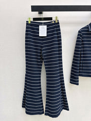 Navy blue flared trousers with beige pinstripes