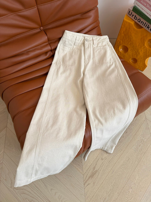 Jeans with leather patch detailing