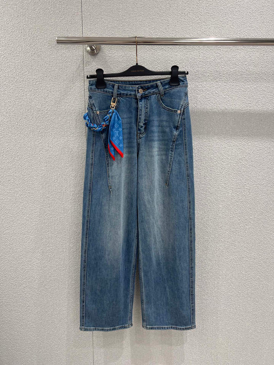 Jeans with a silk scarf chain embellishment