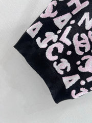 Black and pink color-blocked knit vest
