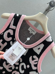 Black and pink color-blocked knit vest