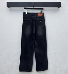 Pleated and distressed denim trousers