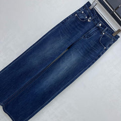 Pleated and distressed denim trousers