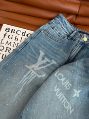 Heavy-duty rhinestone-embellished light blue jeans