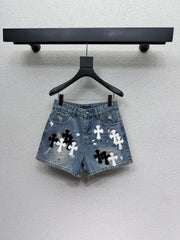 Straight-leg denim shorts with cross pattern
