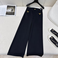 Straight-leg trousers with metal embellishments