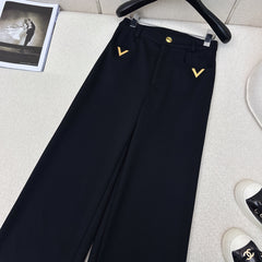 Straight-leg trousers with metal embellishments