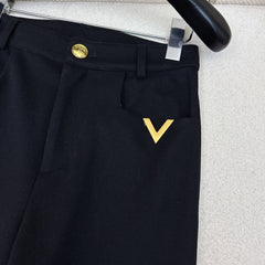 Straight-leg trousers with metal embellishments