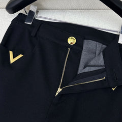 Straight-leg trousers with metal embellishments