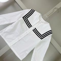Navy-style shirt + pleated skirt