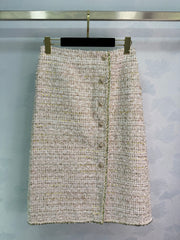 A light beige tweed blend short-sleeved jacket