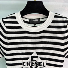 Black and white striped knit short-sleeved top