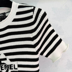 Black and white striped knit short-sleeved top