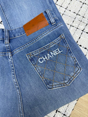 Embroidered mesh flared pants with back pockets