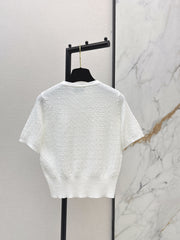 Hardware-embellished short-sleeved knit top