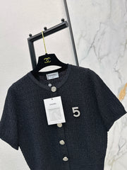 Hardware-embellished short-sleeved knit top