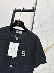 Hardware-embellished short-sleeved knit top